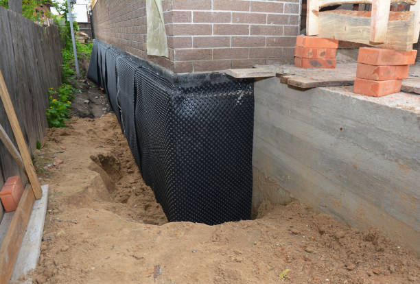 SJ Waterproofing Pros technician performing targeted Waterproofing assessment in Forest Hill, MD